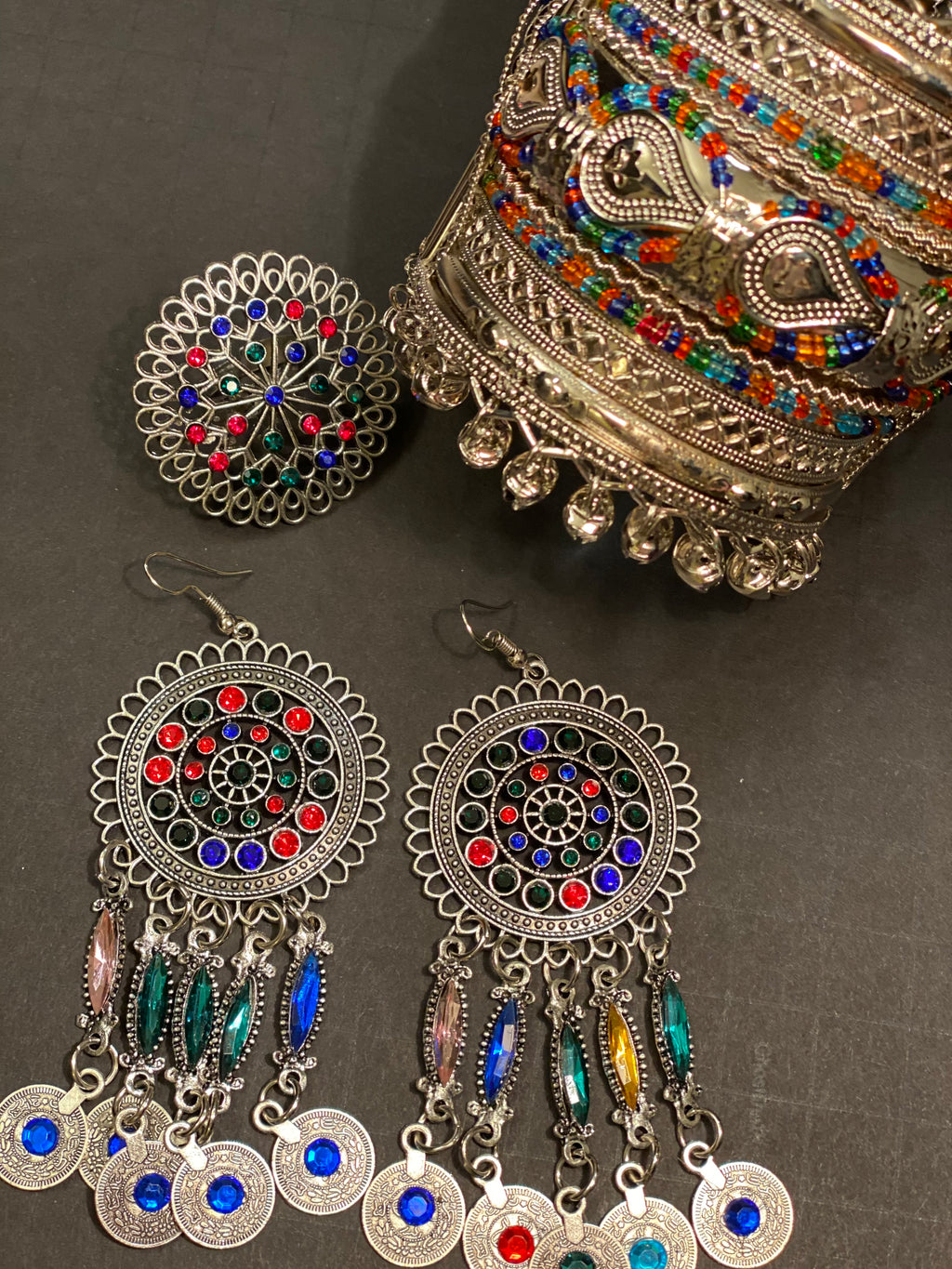 Earrings, ring, and bangle